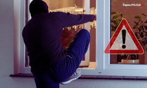 zdjęcie kolorowe: zamaskowany mężczyzna wchodzący przez okno do domu